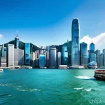 홍콩 스타페리 이용법 - **Prompt:** A vibrant, sun-drenched daytime scene aboard the iconic Hong Kong Star Ferry. The image ...